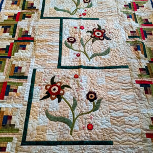 primitive quilt with beautiful applique.